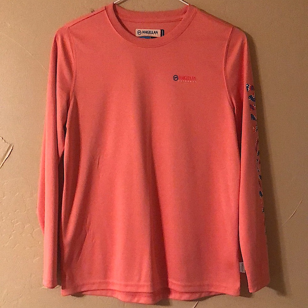 slick pink Magellan shirt.